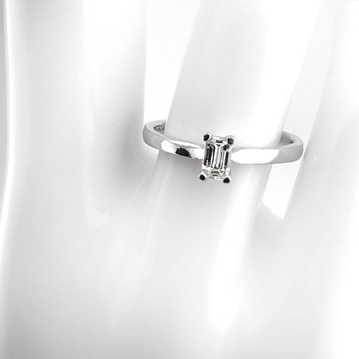 Emerald cut diamond ring, 18ct white gold