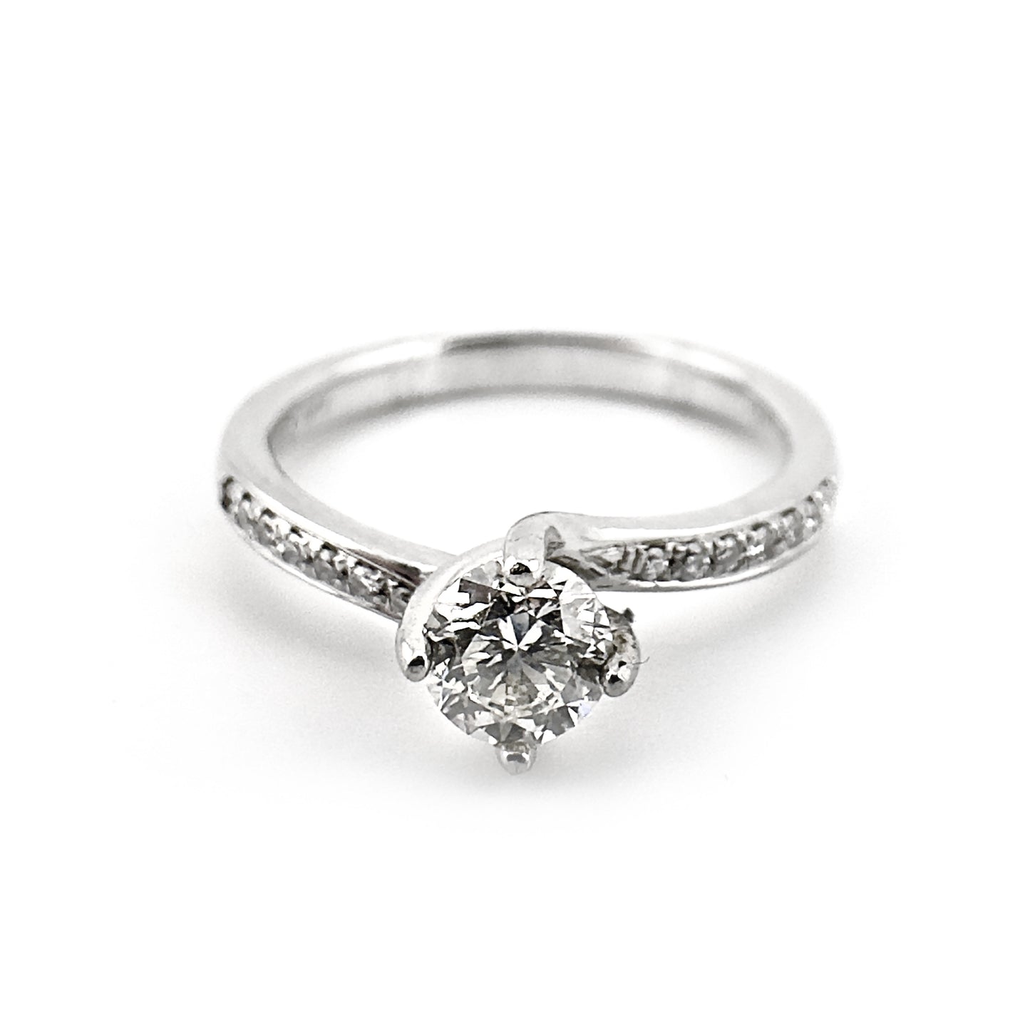 Diamond solitaire ring with diamond shoulders, platinum