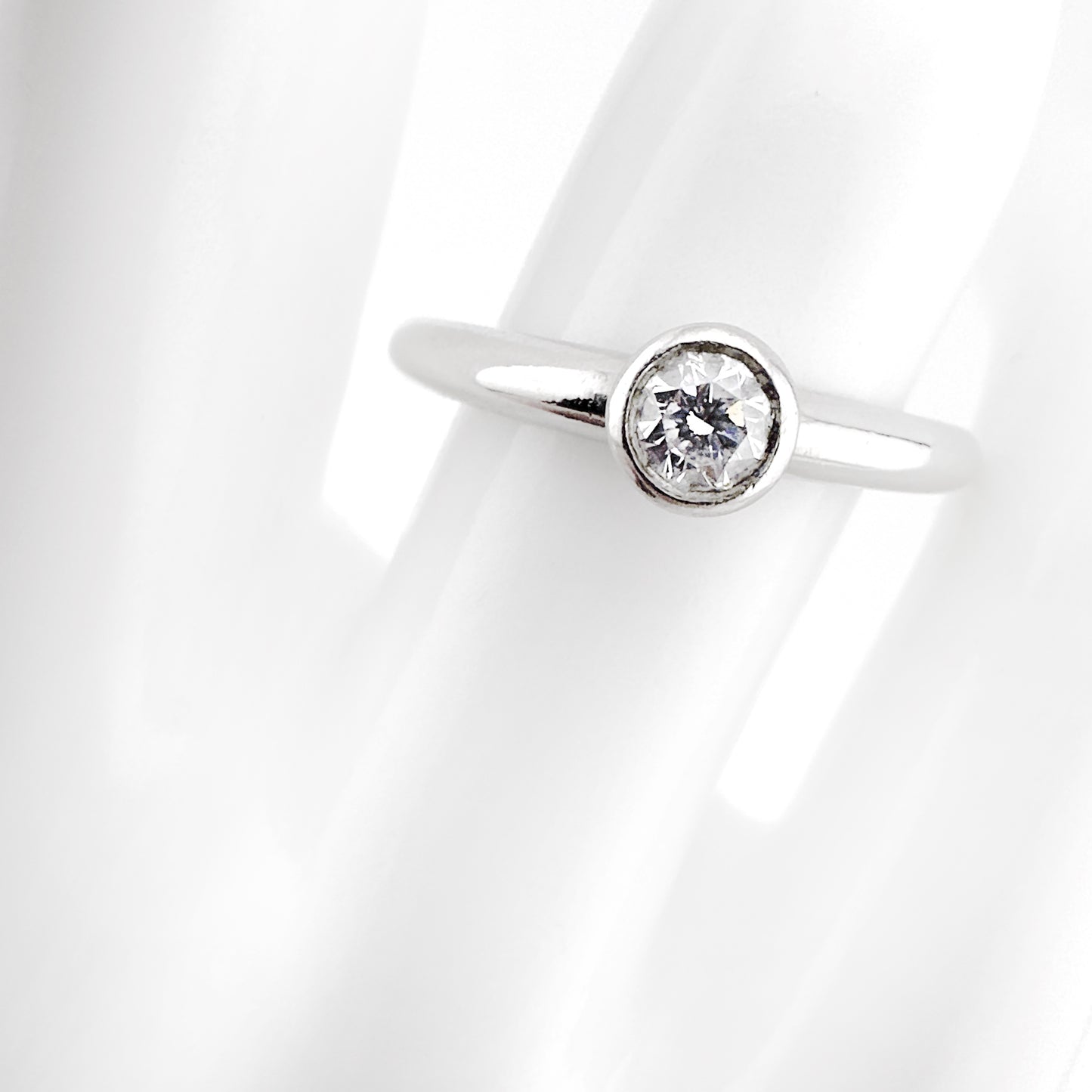 Diamond solitaire rubover ring, 0.35ct, platinum